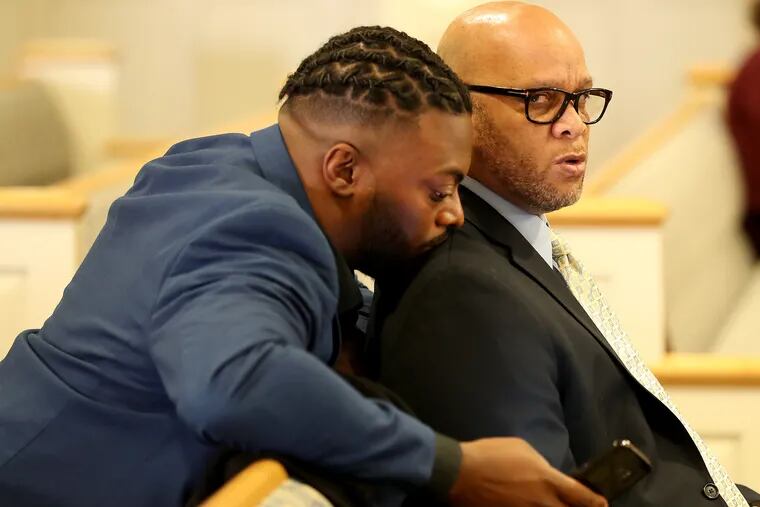 Councilman Jeffree Fauntleroy, left, talks with Atlantic City Mayor Frank Gilliam, right, as they appear at North Wildwood Municipal Court in North Wildwood, N.J. The assault complaints against Gilliam and Fauntleroy were dismissed. Fauntleroy will pay a $500 fine on obstruction of traffic ordinance violation, stemming from a melee outside an Atlantic City casino.