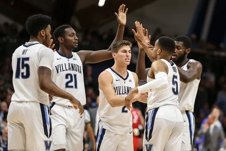 Villanova's defense pulled the Wildcats through, and Phil Booth scored the team’s final five points to ensure a 65-59 victory over the Friars in a Big East game.