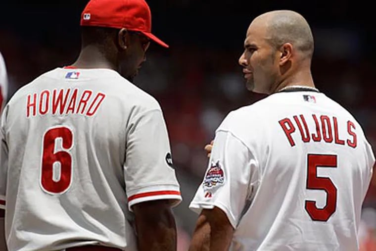 Ryan Howard's new contract has some people comparing him to Albert Pujols. (AP file photo / Jeff Roberson)