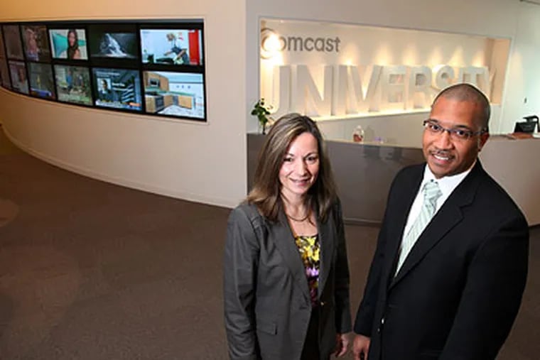 Kathy Avgiris, senior vice president and general manager of data services, and Ajamu Johnson, director of supplier diversity, at Comcast University in Philadelphia.