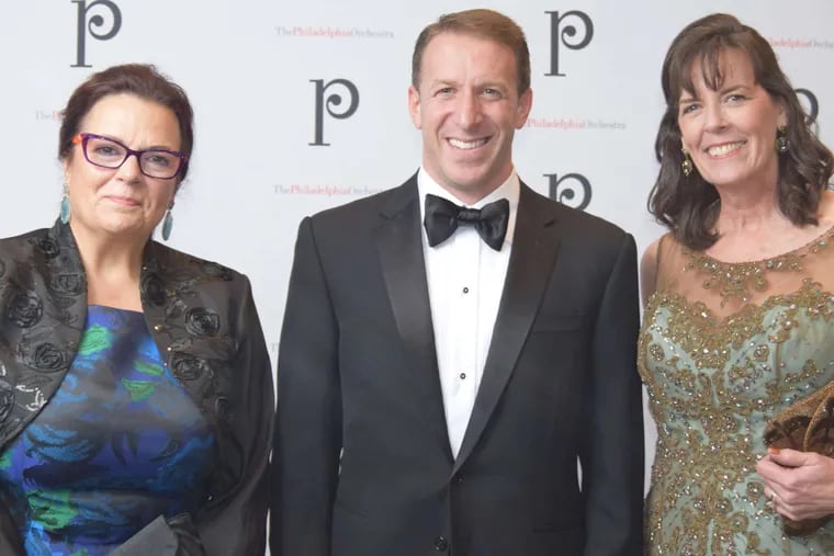 Allison Vulgamore (left), orchestra president and CEO, with co-chairs Gary Frank and Dianne Rotwitt, in happier times.