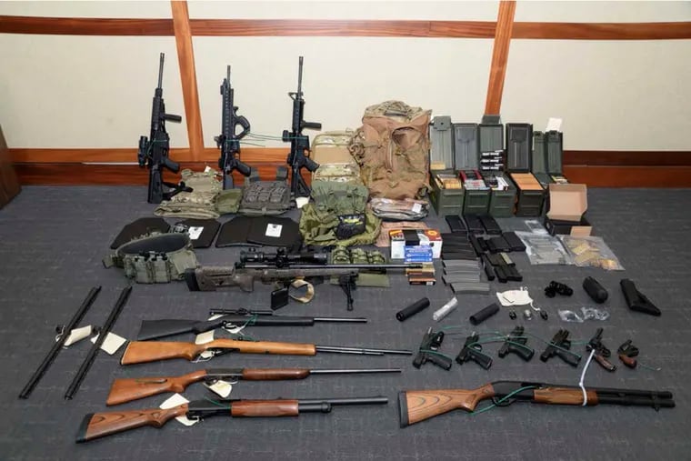 The Maryland U.S. District Attorney's Office shows a photo of firearms and ammunition that was in the motion for detention pending trial in the case against Coast Guard Lt. Christopher Hasson, accused of stockpiling guns and targeting Supreme Court justices, prominent Democrats and TV journalists.