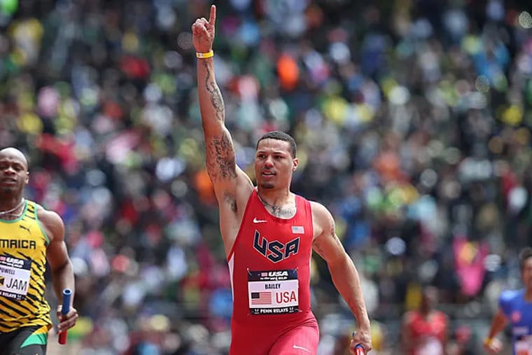 Red Team USA's Ryan Bailey celebrates after finishing first the USA
vs. the World Men 4x400 event. (David Maialetti/Staff Photographer)