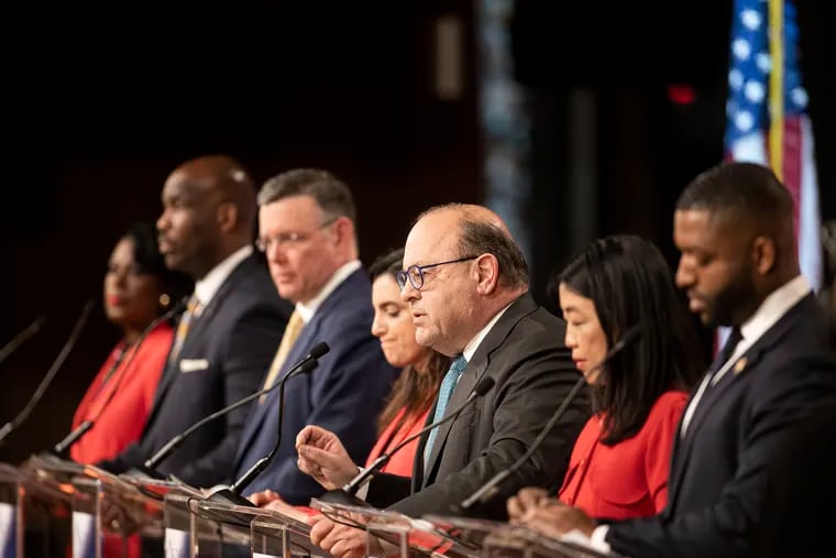 Candidates for the Philadelphia mayor, from left, former City Councilmember Cherelle Parker, former City Councilmember Derek Green (who has since suspended his campaign), businessman Jeff Brown, former City Controller Rebecca Rhynhart, former Councilmember Allan Domb, former Councilmember Helen Gym, and state Rep. Amen Brown debate at Temple earlier this month.
