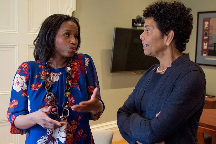 Nyeema Watson, Assistant Chancellor at Rutgers-Camden for Civic Engagement, left, talks with Chancellor Phoebe Haddon.