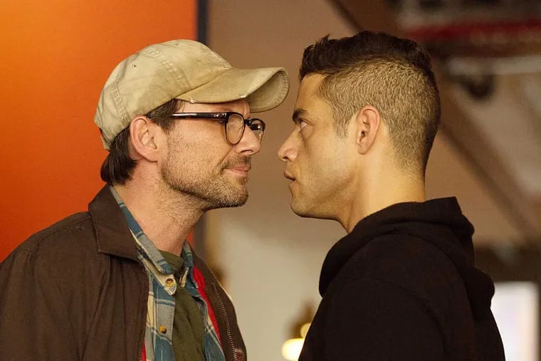 Rami Malek (right) as Elliot Alderson and Christian Slater as the title character in "Mr. Robot."
