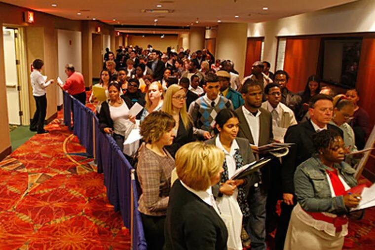Some 4,000 job seekers lined up for a job fair featuring 25 employers at the Center City Marriott on Thursday. (ALEJANDRO A. ALVAREZ / Staff Photographer)