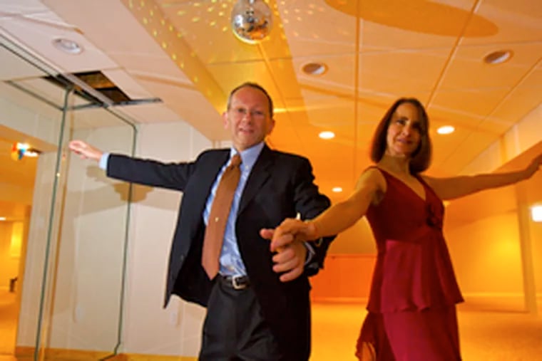 Joseph Murphy with dancing partner Judy Wiener. Murphy advises large companies on training employees how to avoid ethics and compliance problems. Business has boomed with enactment of Sarbanes-Oxley.