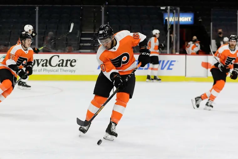 Zayde Wisdom skates with the puck during a Flyers intrasquad game in January.