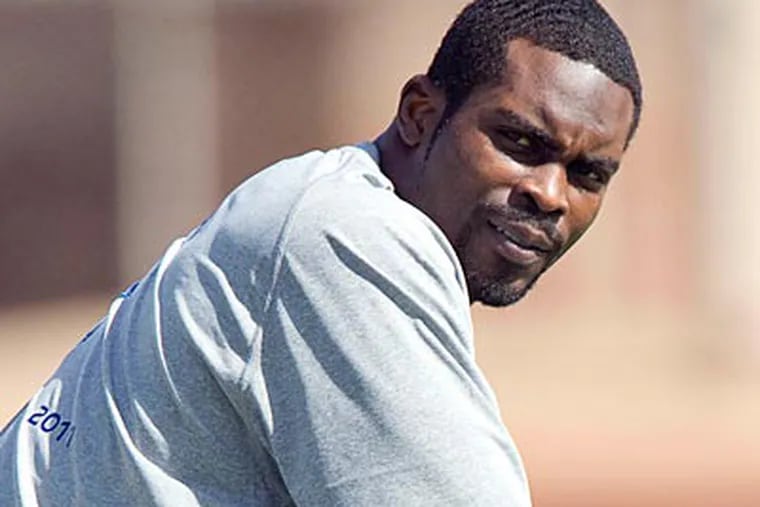 Eagles quarterback Michael Vick will not attend a Super Bowl party that was billed as being his own. (Eugene Tanner/AP)