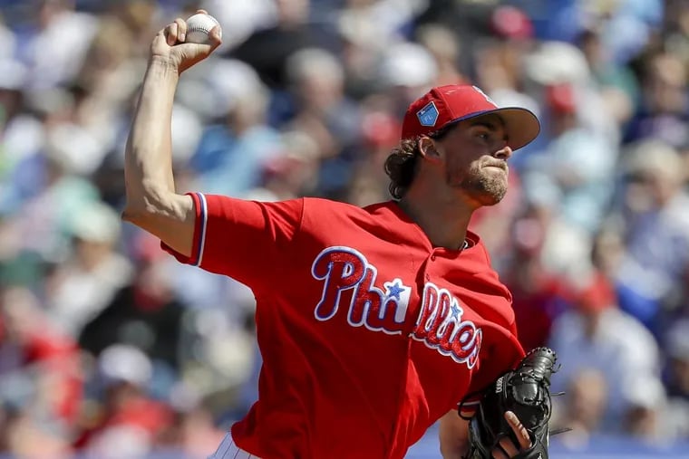 Phillies pitcher Aaron Nola works in the fourth inning against the Boston Red Sox.