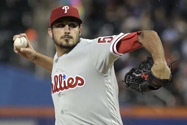 Phillies pitcher Zach Eflin delivers the ball to the New York Mets during the first inning of a baseball game Saturday,  in New York.