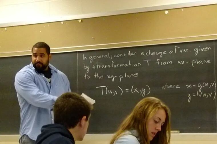 John Urschel, a right guard on Penn State’s football team, teaches integral vector calculus to a class of undergraduates. (Tom Avril / Staff)