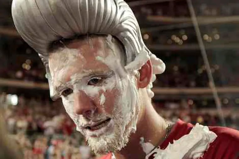Not only did Stephen Strasburg get the traditional pie-in-the-face greeting from teammates after his first major-league victory; they added the wig for good measure after he beat the Pittsburgh Pirates.