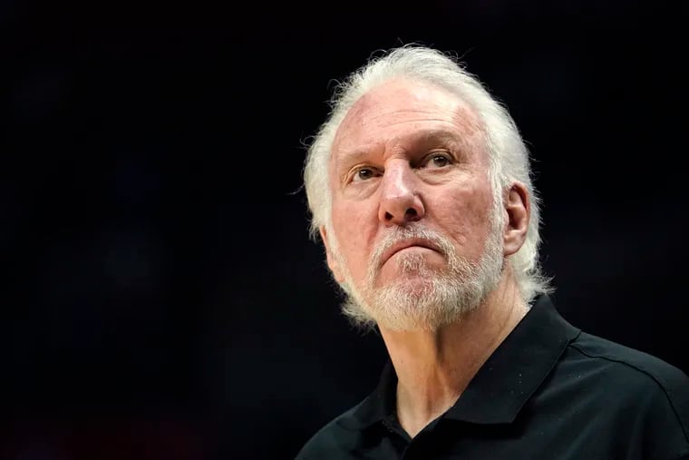 San Antonio Spurs head coach Gregg Popovich looks toward the scoreboard during the second half of an NBA basketball game against the Los Angeles Clippers Tuesday, Nov. 16, 2021, in Los Angeles. (AP Photo/Mark J. Terrill)