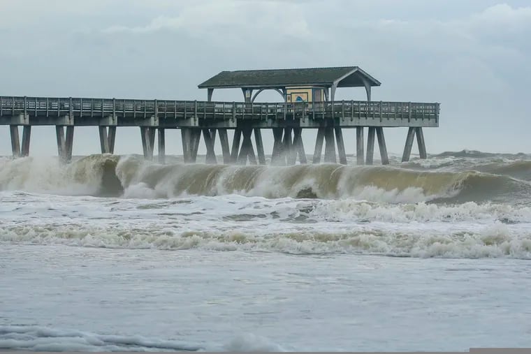 Large waves crashed onto the beach of Tybee Island, Ga., Wednesday, Sept. 4, 2019 as Hurricane Dorian moved closer to the Georgia coast.