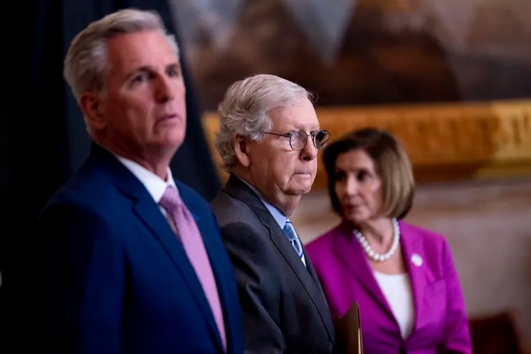 House Minority Leader Kevin McCarthy, Senate Minority Leader Mitch McConnell, and House Speaker Nancy Pelosi in the Rotunda of the U.S. Capitol Building in September.