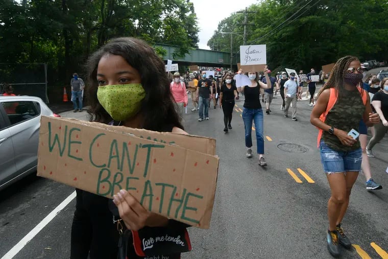 Leila Soleman, of Philadelphia marches with the BLM solidarity protest in Mt Airy, on June 5, 2020.