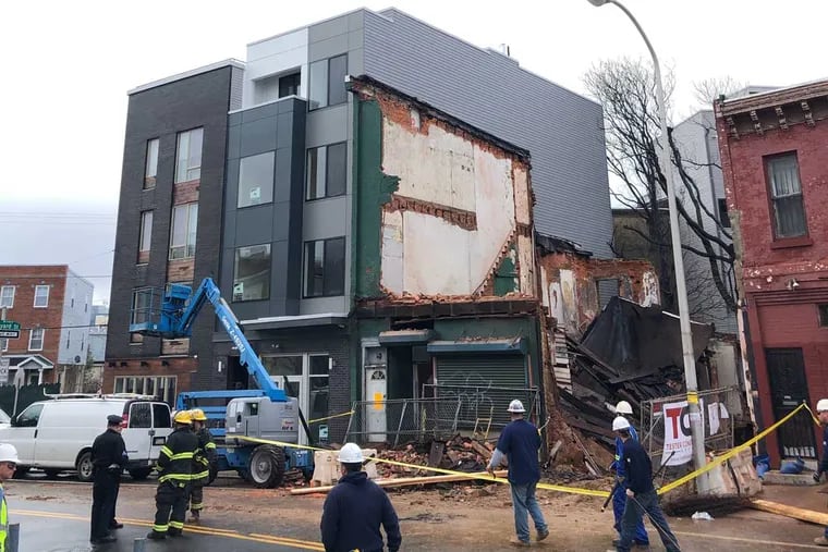 Two workers were trapped and then rescued when building collapsed at Ridge Avenue and Vineyard Street in North Philadelphia on Dec. 21, 2018.