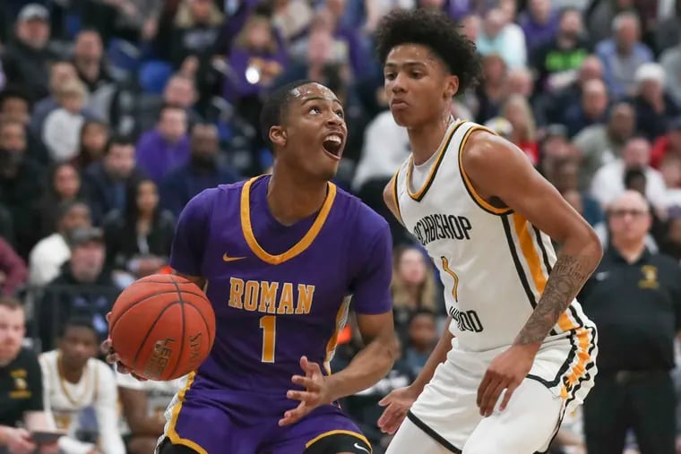 Roman Catholic guard Xzayvier Brown drives past Archbishop Wood’s Jalil Bethea in the first half of a in the PIAA 6A semifinal game at Bensalem High School on Tuesday, March 21.