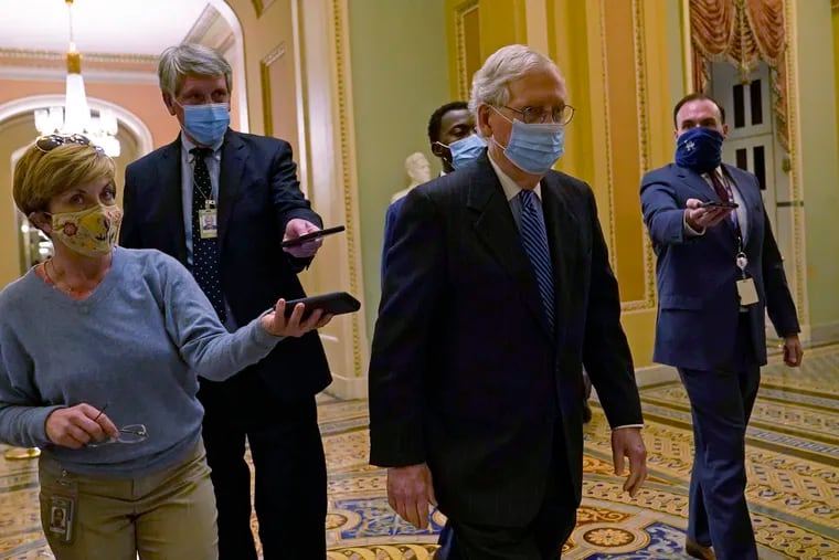Senate Majority Leader Mitch McConnell, shown walking past reporters on Capitol Hill in Washington on Tuesday.