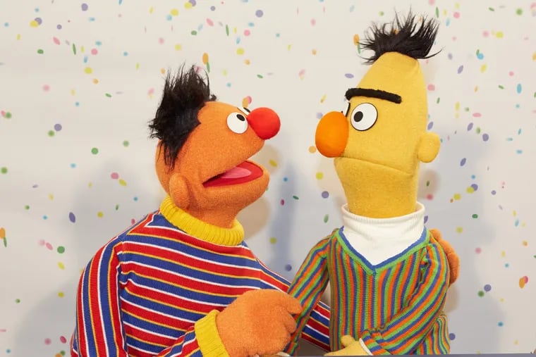 "Sesame Street" Muppets Ernie, left, and Bert pose for photographs during a press conference on Jan. 7, 2013 on the 40th anniversary of the show's premiere in Germany. On Jan. 8, 1973, the children's television series first aired there.