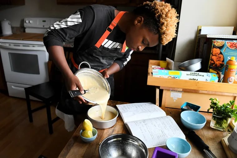Michael Platt makes a lemon cake at his home Bowie, Maryland. The 13-year-old started Michaels Desserts and gives away one cupcake to the homeless for every one he sells. Washington Post photo by Katherine Frey