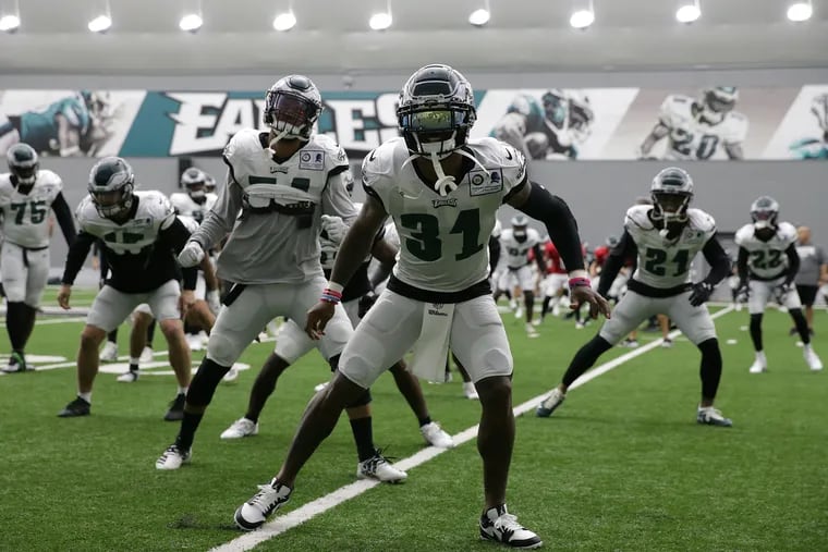 Cornerbacks Jalen Mills (31) and Ronald Darby (21) returned to practice Wednesday. Both of them may play Sunday against the Cowboys.