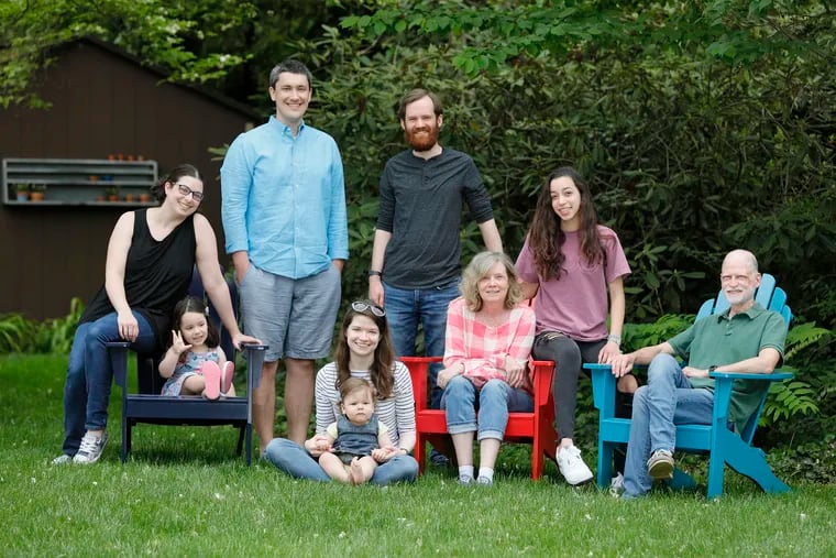 In isolation together, an extended family agreed to share a quarantine bubble, meaning they can hang out together as normal while avoiding contact with others. They are Wynnewood residents Peter Liston (far right) and Brigid Maguire (seated next to him), and their three daughters, two of their grandchildren, and their daughters' partners. At far left is Caitlin Liston and her 3-year-old daughter, Elizabeth Pop;  Elizabeth’s father, Armin Pop; and Caitlin's sister, Kellie Liston, seated with Caitlin's 14-month-old daughter, Amelia Pop. Behind Brigid are Ben Simon (Kellie's fiancee) and Caitlin’s sister Maya.