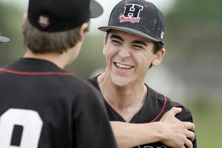 Haddonfield junior pitcher Aidan Barr, who struck out the side in the last inning, is surrounded by celebrating teammates after Haddonfield beat Eastern in the Diamond Classic semifinals.