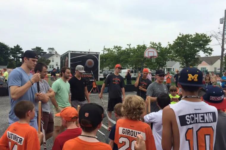Flyers prospects meet with fans during their annual trek to the shore. (Jeff Neiburg / Daily News staff)