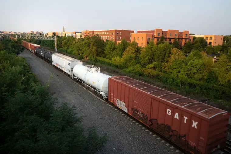 A CSX freight train travels through Alexandria, Va.