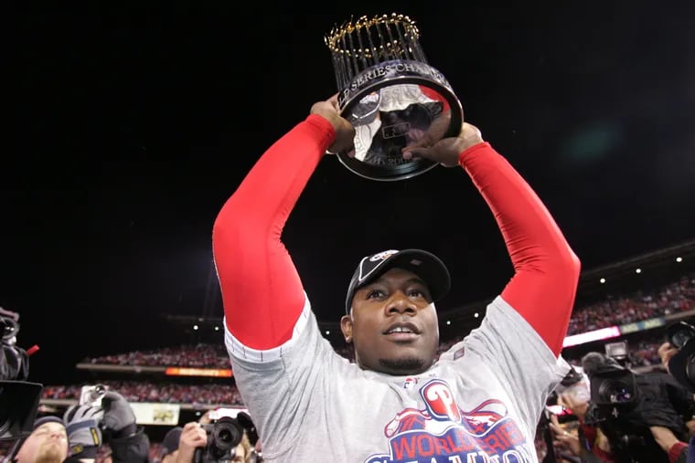 Ryan Howard holds up the World Series trophy after the Phillies won the World Series in 2008.
