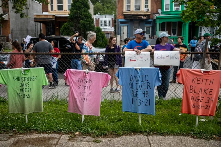Around 40 shirts are placed at Wyalusing Park with the names, age, and date of victims killed from gun violence for the nationwide March for Our Lives in West Philadelphia on June 11.