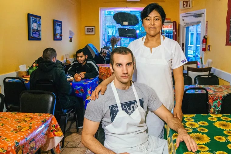 Owner/chef Cristina Martinez and her co-owner husband Ben Miller inside their South Philadelphia Mexican restaurant Barbacoa on Sunday, Oct. 4, 2015. (MICHAEL BUCHER/For the Inquirer)
