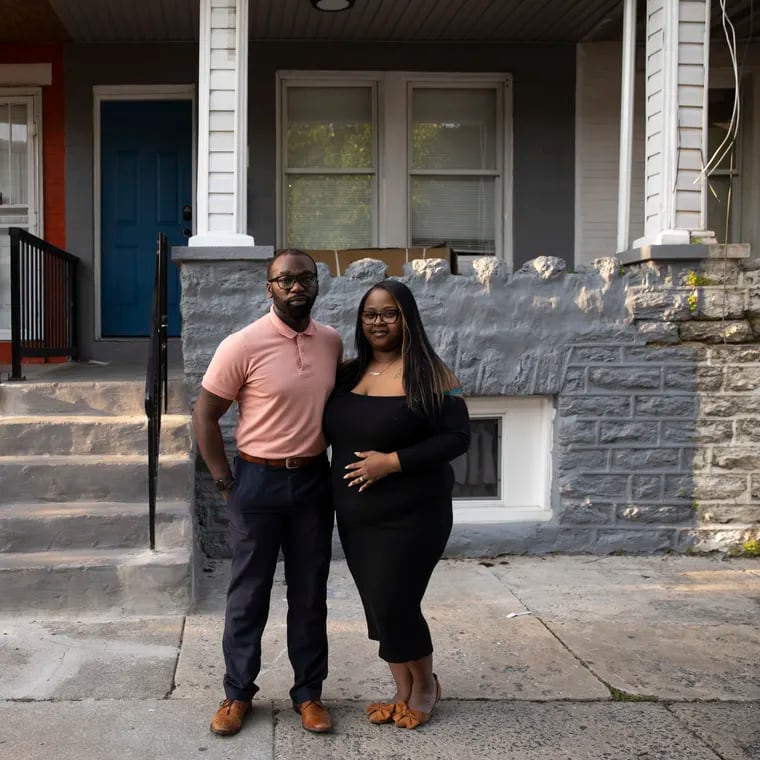Darnell and Shirda Hudson near their new home in Olney. They bought it through the Pennsylvania Housing Finance Agency's Revitalizing Neighborhoods and Increasing Homeownership pilot program for first-time home buyers.