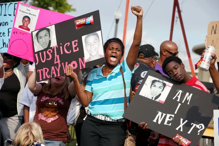 Protestors at a rally in March 2012 for Trayvon Martin, a black teenager who was fatally shot by George Zimmerman, a neighborhood watch captain in Sanford, Fla., on Feb. 26, 2012.