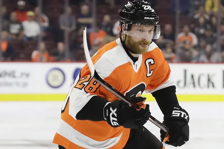 Flyers left winger Claude Giroux skates against the New York Islanders in a preseason game Monday, Giroux is coming off a career-best 102-point season.