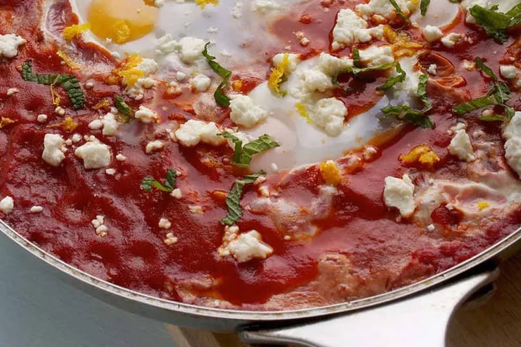 Baked Eggs With Sausage, Tomatoes and Mint. (Photo for The Washington Post by Deb Lindsey)