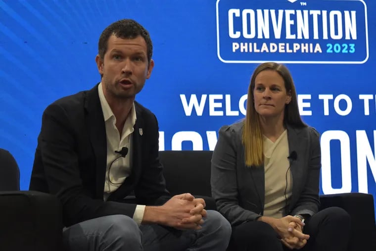 U.S. Soccer Federation president Cindy Cone (right) and CEO JT Batson (left) at last week's United Soccer Coaches convention in Philadelphia.