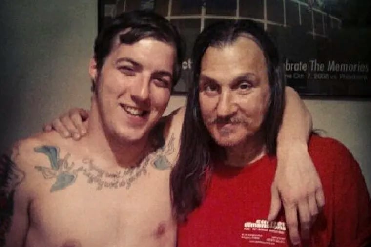 Michael Berk (right) died of a drug overdose inside a “recovery home” run by Jeffrey Jackson (not pictured), an addictions counselor at Addiction Medicine & Health Advocates in Kensington. Here, Berk shares a warm moment with his 28-year-old son, Jordan Berk (left), shortly before his death in April 2014.
