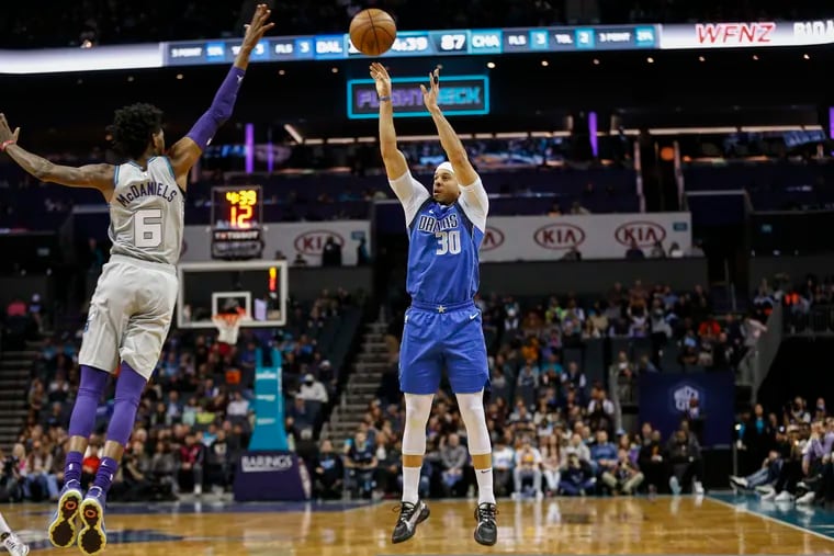 Former Dallas Mavericks guard Seth Curry (right) is one of many sharpshooters on the Sixers roster.