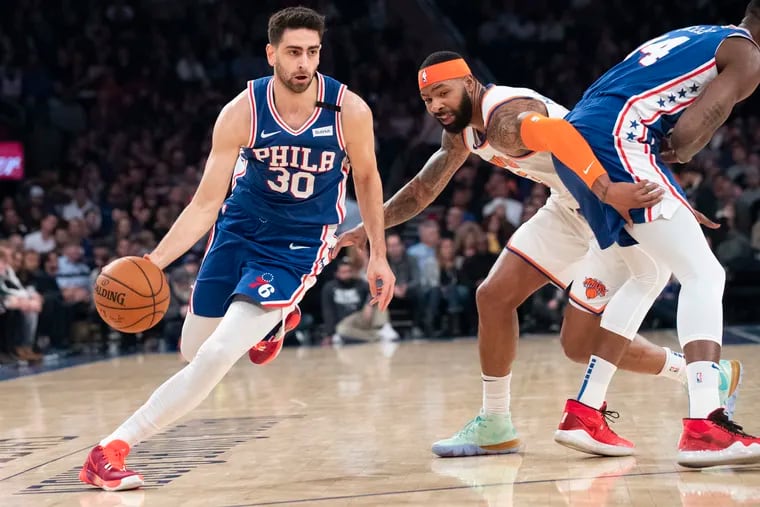 Furkan Korkmaz drives against New York Knicks forward Marcus Morris in the first half at Madison Square Garden in New York. (AP Photo/Mary Altaffer)