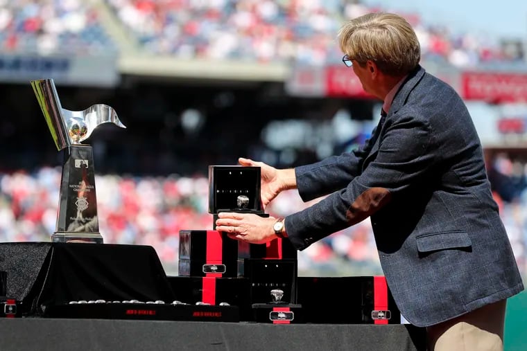 Phillies Managing Partner John Middleton displays the National League Championship rings.