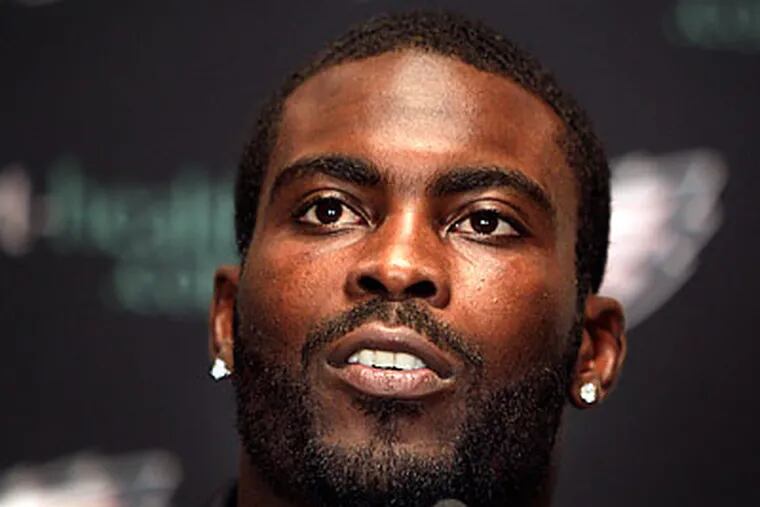 "I'm just trying to be the best person that I can be," Michael Vick said yesterday. (David Maialetti/Staff Photographer)