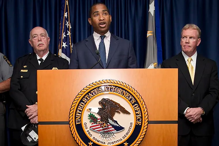 Zane Memeger, United States attorney with the Eastern District of Pennsylvania, and other law-enforcement officers gathered in Philadelphia on Friday afternoon, September 26, 2014. They announced the arrest of more than 30 people for distribution of drugs in Chester, Pa. ( ALEJANDRO A. ALVAREZ / STAFF PHOTOGRAPHER )