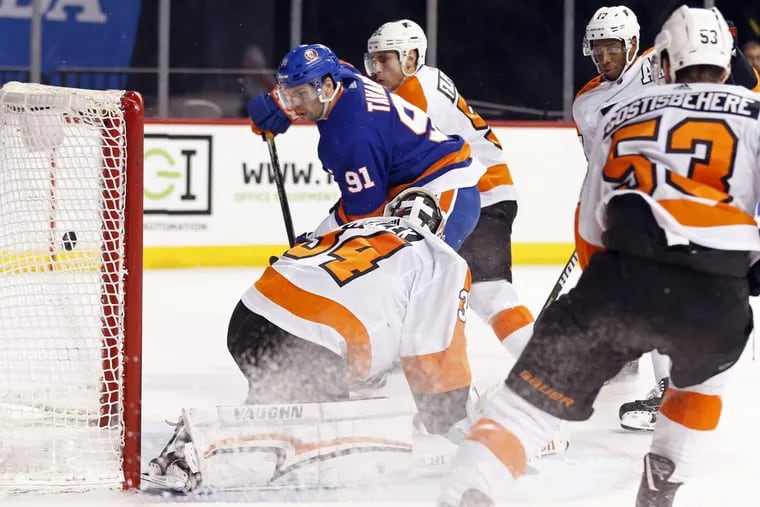 New York Islanders center John Tavares (91) beats Flyers goaltender Petr Mrazek for his second goal of the game, giving the hosts a 4-1 second-period lead Tuesday.