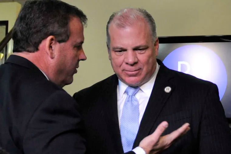 New Jersey Senate President Steve Sweeney (right), shown with Gov. Christie, hasn't given up on a bill that could threaten a source of revenue for the state's newspapers.