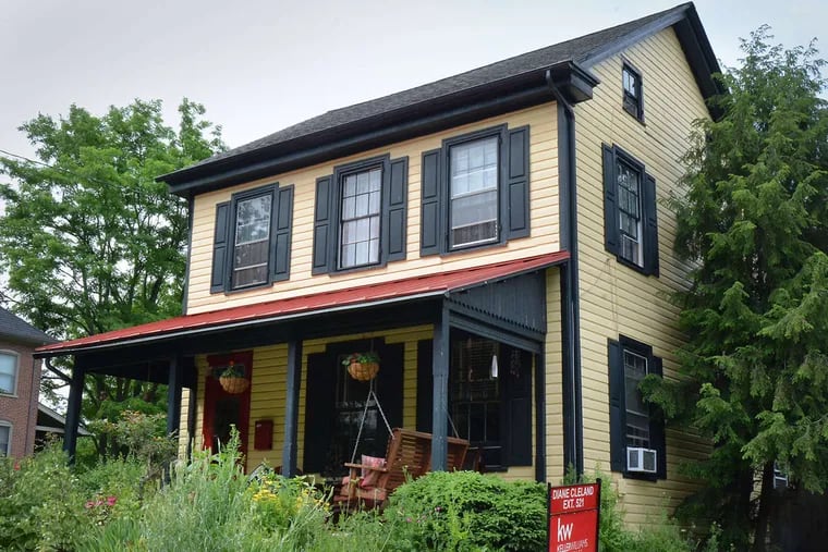 Surrounded by greenery, this home at 215 Washington Ave. is on the market for $339,000. The residence is part of the town's burgeoning and reasonable real estate.
