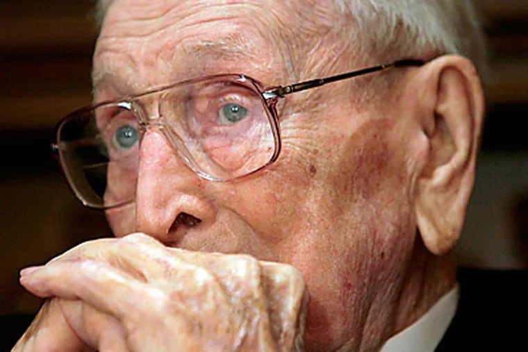 Former UCLA men's basketball coach John Wooden is reportedly in 'grave' condition at a Los Angeles hospital. (AP Photo/Nick Ut)